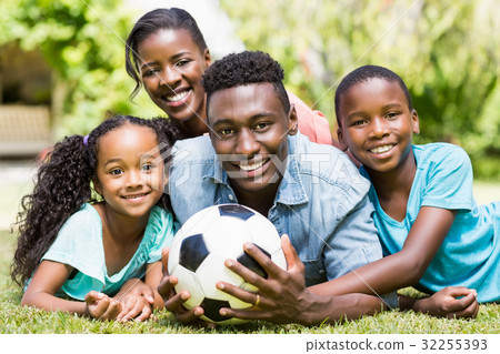 Happy family posing together Happy family posing together 32255393