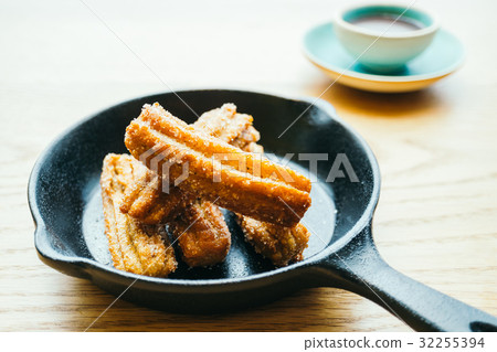 Sweet fried Churros donut with chocolate sauce 32255394