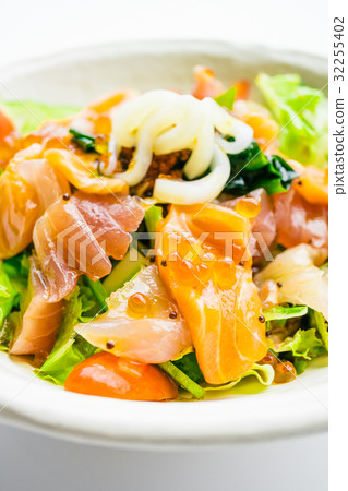 Mixed seafood salad with salmon tuna squid and other fish Mixed seafood salad with salmon tuna squid and other fish 32255402