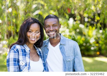Happy couple posing together Happy couple posing together 32255462