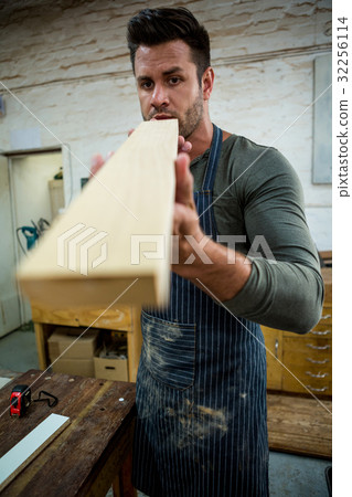 Carpenter working on his craft Carpenter working on his craft 32256114