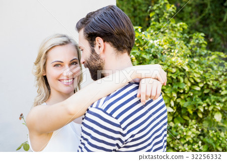 Couple embracing each other Couple embracing each other 32256332