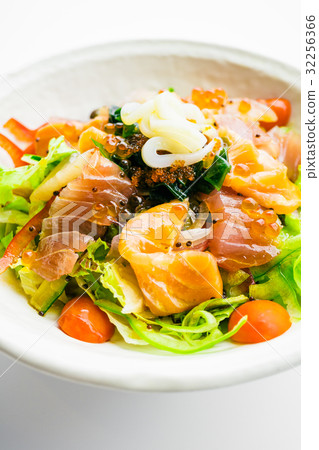 Mixed seafood salad with salmon tuna squid and other fish 32256366