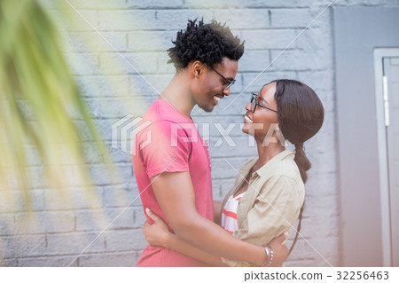 Young couple embracing each other Young couple embracing each other 32256463