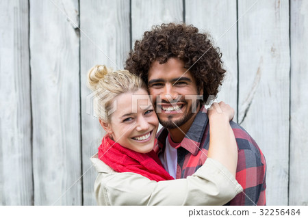 Young couple embracing each other Young couple embracing each other 32256484