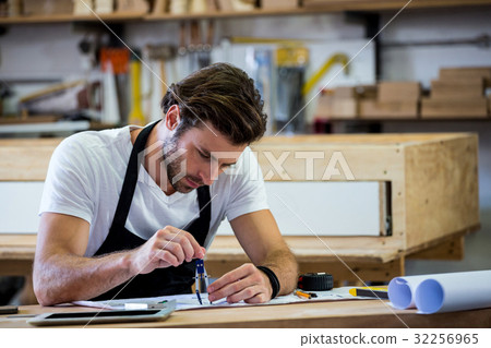 Carpenter working on his craft Carpenter working on his craft 32256965
