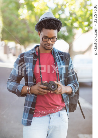 Young man looking into camera 32257536