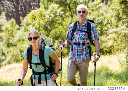 Senior couple standing with their stick 32257854