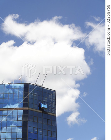 Window wiping of skyscrapers and blue sky 32258759