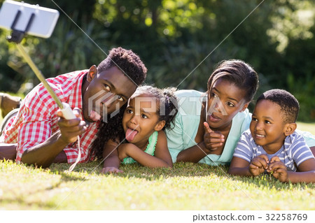 Happy family taking picture 32258769