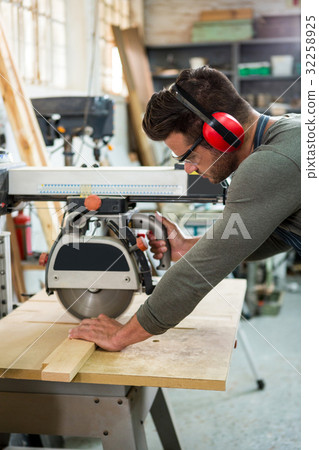 Carpenter working on his craft Carpenter working on his craft 32258925