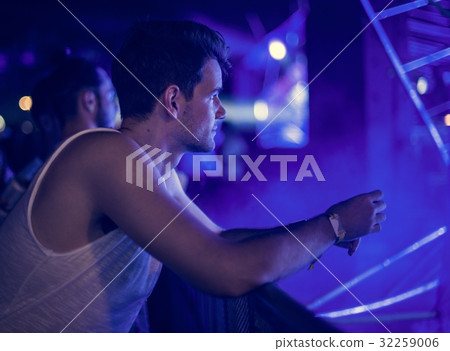 Man Sitting Alone Watching Live Concert 32259006