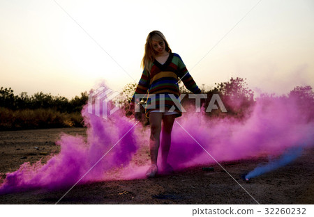 Woman Hands Holding Pink Smoke Bomb Outdoors Woman Hands Holding Pink Smoke Bomb Outdoors 32260232
