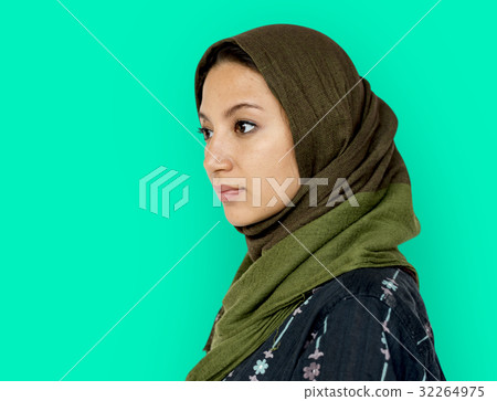 Middle eastern woman casual studio portrait Middle eastern woman casual studio portrait 32264975