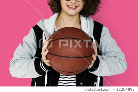 Young Adult Woman with Basketball Studio Portrait 32264992