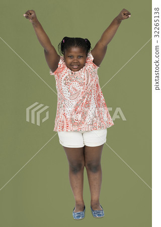 Little girl hands up studio portrait 32265138