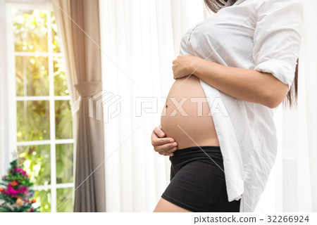 Beautiful Pregnant Woman Hugging the Belly 32266924