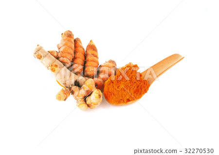 Turmeric powder on a wooden spoon  32270530