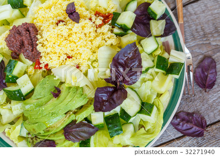 Vegetarian green salad with basil and couscous Vegetarian green salad with basil and couscous 32271940