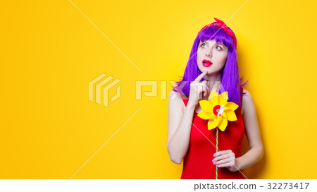 girl with pinwheel toy girl with pinwheel toy 32273417