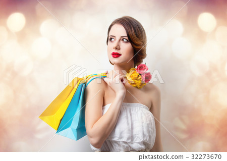 woman with colorful shopping bags 32273670