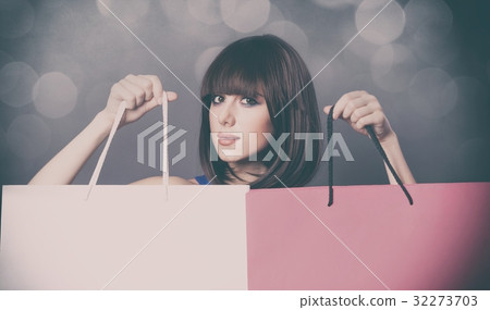 woman with colorful shopping bags woman with colorful shopping bags 32273703