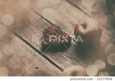 apples and heart shaped toy apples and heart shaped toy 32274098