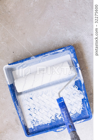 Bucket with paint and a brush roller paint tray Bucket with paint and a brush roller paint tray 32275600