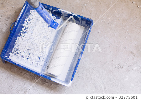 Bucket with paint and a brush roller paint tray Bucket with paint and a brush roller paint tray 32275601