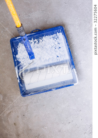 Bucket with paint and a brush roller paint tray Bucket with paint and a brush roller paint tray 32275604