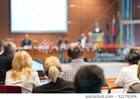 Public speaker giving talk at business event. Public speaker giving talk at business event. 32276304
