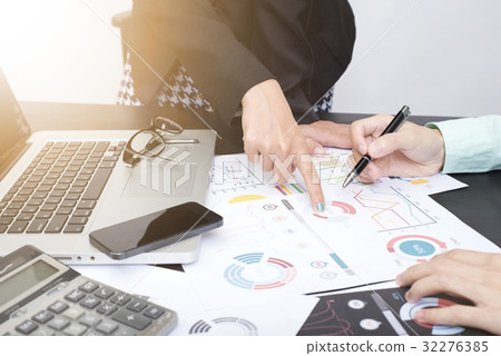 accountant with document graph financial on office accountant with document graph financial on office 32276385