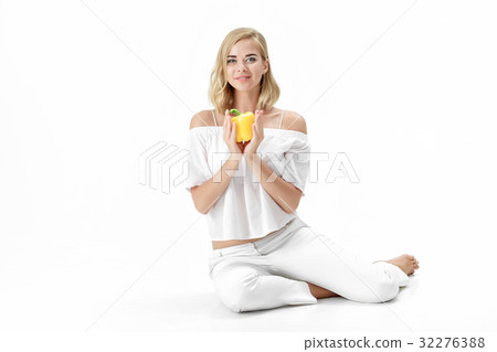 Beautiful blond woman in white blouse holding Beautiful blond woman in white blouse holding 32276388