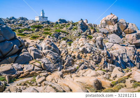 White lighthouse of Capo Testa in north Sardinia White lighthouse of Capo Testa in north Sardinia 32281211