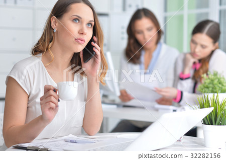 Portrait of a pleasant business woman  32282156