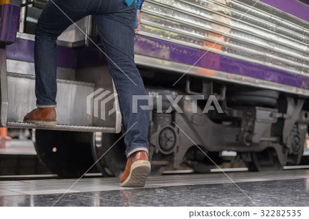 man traveler with backpacker at trainstation 32282535
