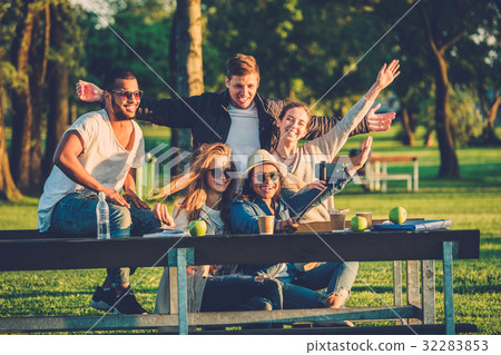 Multi-ethnic group of friends taking a selfie with Multi-ethnic group of friends taking a selfie with 32283853