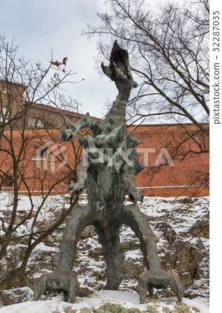 Dragon of Wawel castle sculpture in Krakow, Poland 32287035