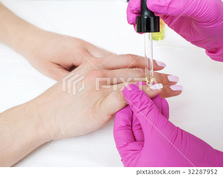 Spa oil treatment as manicure step 32287952