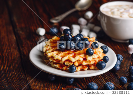 Waffles with Blueberry and Syrup. 32288111