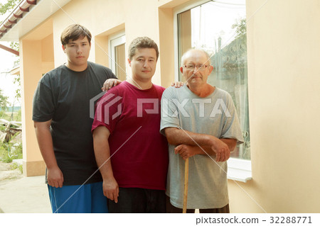 Father, son and grandson on veranda Father, son and grandson on veranda 32288771