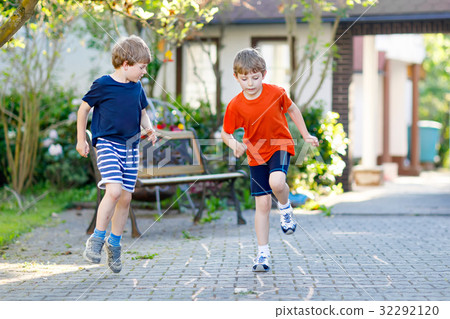 Two little school and preschool kids boys playing 32292120