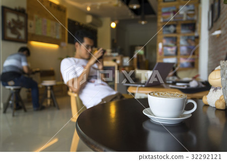 A cup of coffee in a white cup A cup of coffee in a white cup 32292121