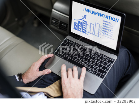 Hands working on laptop network graphic overlay 32295902
