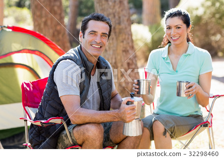 Couple sitting and taking some drink 32298460