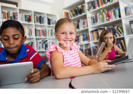 Portrait of smiling girl with tablet pc Portrait of smiling girl with tablet pc 32299687