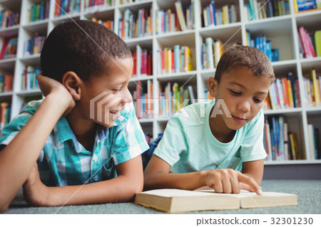 Little boys reading a book Little boys reading a book 32301230