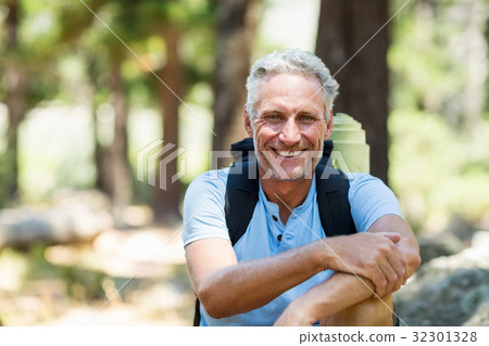 Hiker smiling and posing Hiker smiling and posing 32301328