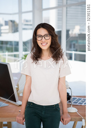 A business woman is standing A business woman is standing 32301381