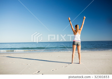 Fit blonde woman on the beach Fit blonde woman on the beach 32301653